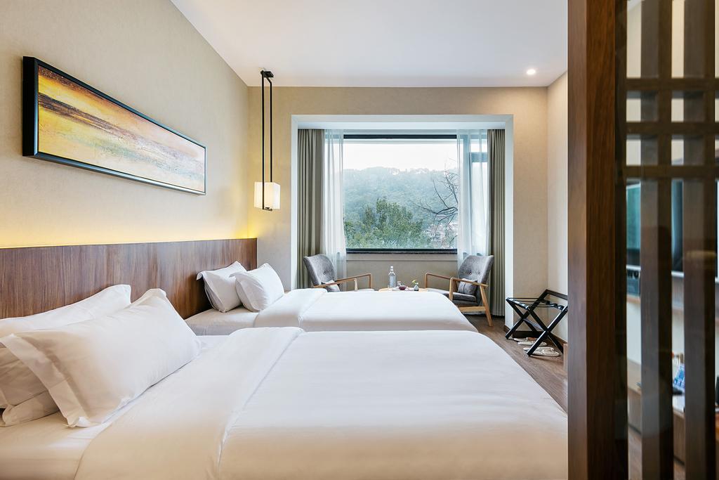 Hangzhou Puyu Travelling With Hotel Exterior photo